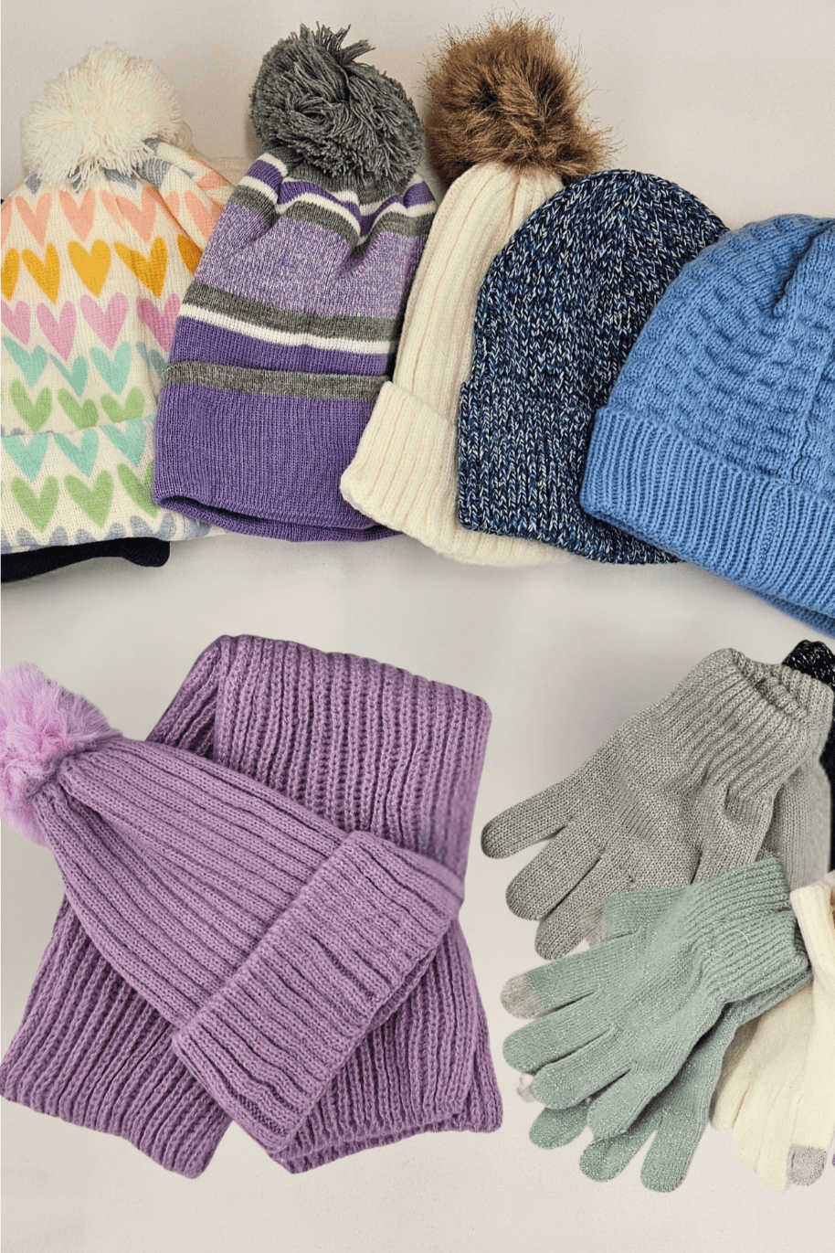 - Weekend Backpacks Baltimore An assortment of hats, gloves and scarves in a pile on a table.